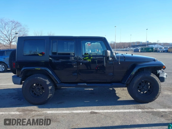 2010 Jeep Wrangler Unlimited Sahara with VIN 1J4HA5H16AL215659, listed as a IAAI auction lot 41749218 with 55,544 mi miles. Bid and sale history available at carsss.com. Image 13.