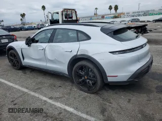 2023 Porsche Taycan 4 with VIN WP0BA2Y13PSA60032, listed as a Copart auction lot 68658963 with 4,572 mi miles and . Bid and sale history available at DreamBid. Image 2.