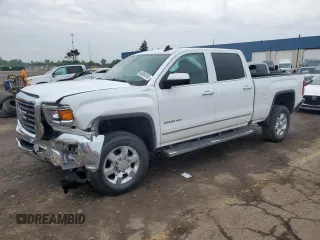 2016 GMC Sierra 2500HD SLT with VIN 1GT12TEG2GF203937, listed as a Copart auction lot 60084155 with 121,191 mi miles and Clean title. Bid and sale history available at DreamBid. Image 1.