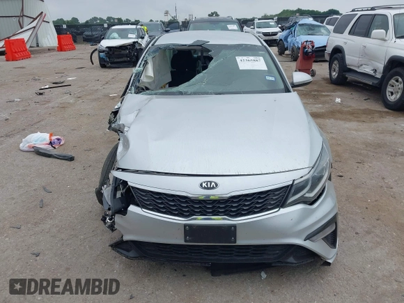 2019 Kia Optima LX with VIN 5XXGT4L38KG330893, listed as a IAAI auction lot 42365887 with 114,368 mi miles and . Bid and sale history available at DreamBid. Image 12.