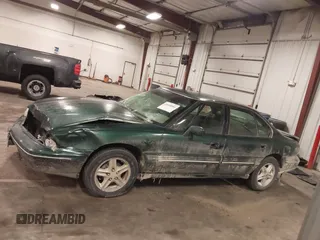 1997 Pontiac Bonneville SE z VIN 1G2HX52KXVH250272, wystawiony jako IAAI lot #41644041 z przebiegiem 160 791 mil mil oraz . Historia ofert i sprzedaży dostępna na DreamBid. Obrazek 15.