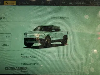 2023 Rivian R1T Adventure with VIN 7FCTGAAA2PN017170, listed as a Copart auction lot 77473014 with 28,821 mi miles and Salvage Title. Bid and sale history available at DreamBid. Image 9.