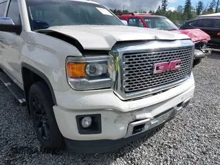 2014 GMC Sierra 1500 Denali z VIN 3GTU2WEJXEG527496, wystawiony jako IAAI lot #42211521 z przebiegiem 151 974 mil mil oraz . Historia ofert i sprzedaży dostępna na DreamBid. Obrazek 6.