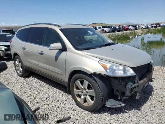 2012 Chevrolet Traverse LTZ z VIN 1GNKVLEDXCJ157466, wystawiony jako Copart lot #56336585 z przebiegiem 207 105 mil mil oraz Szkoda całkowita • Salvage title. Historia ofert i sprzedaży dostępna na DreamBid. Obrazek 4.