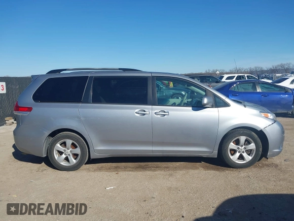 2011 Toyota Sienna LE AAS with VIN 5TDKK3DCXBS143921, listed as a IAAI auction lot 41689053 with 199,854 mi miles. Bid and sale history available at carsss.com. Image 13.