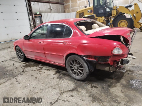 2004 Jaguar X-Type with VIN SAJEA51CX4WE15195, listed as a Copart auction lot 57868405 with 171,698 mi miles and Non Repairable. Bid and sale history available at DreamBid. Image 2.