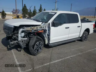 2023 Ford F-150 Lightning Pro with VIN 1FTVW1EL2PWG14326, listed as a Copart auction lot 61828315 with 40,148 mi miles and Clean title. Bid and sale history available at DreamBid. Image 1.