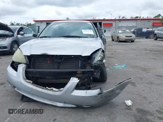 2004 Nissan Altima S with VIN 1N4AL11D04C130857, listed as a IAAI auction lot 41661519 with 147,518 mi miles. Bid and sale history available at carsss.com. Image 6.