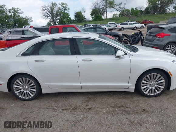 2016 Lincoln MKZ with VIN 3LN6L2J91GR620212, listed as a IAAI auction lot 42339396 with 90,195 mi miles and . Bid and sale history available at DreamBid. Image 13.