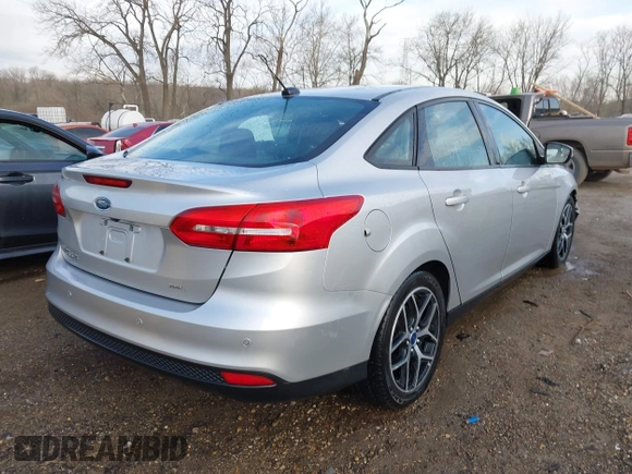 2017 Ford Focus SEL with VIN 1FADP3H23HL221712, listed as a IAAI auction lot 41823077 with 51,233 mi miles. Bid and sale history available at carsss.com. Image 4.