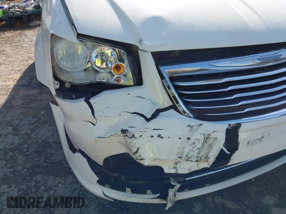 2012 Chrysler Town & Country Touring L with VIN 2C4RC1CGXCR163522, listed as a IAAI auction lot 41923296 with 218,342 mi miles and . Bid and sale history available at DreamBid. Image 6.