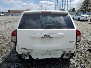 2016 Jeep Compass High Altitude Edition with VIN 1C4NJCEA7GD789837, listed as a Copart auction lot 52000505 with 96,396 mi miles and Salvage Title. Bid and sale history available at carsss.com. Image 6.