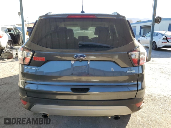 2017 Ford Escape SE with VIN 1FMCU0GD5HUF05252, listed as a Copart auction lot 83610274 with 100,481 mi miles and Clean Title. Bid and sale history available at carsss.com. Image 6.