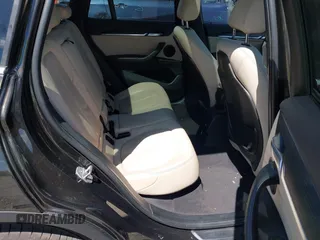 2016 BMW X1 xDrive28i with VIN WBXHT3C3XGP889833, listed as a IAAI auction lot 39118131 with 111,343 mi miles. Bid and sale history available at carsss.com. Image 8.