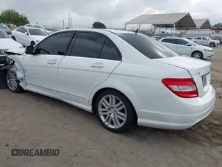 2009 Mercedes-Benz C-Class 3.0L Sport with VIN WDDGF54X39R050407, listed as a IAAI auction lot 42105946 with 197,471 mi miles. Bid and sale history available at carsss.com. Image 3.