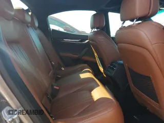 2014 Maserati Ghibli S Q4 z VIN ZAM57RTA8E1113640, wystawiony jako Copart lot #60359715 z przebiegiem Nie podano mil oraz Czysty tytuł • Clean title. Historia ofert i sprzedaży dostępna na DreamBid. Obrazek 10.