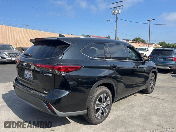 2021 Toyota Highlander Hybrid XLE z VIN 5TDHARAH6MS509148, wystawiony jako IAAI lot #42545107 z przebiegiem 76 689 mil mil oraz . Historia ofert i sprzedaży dostępna na DreamBid. Obrazek 7.
