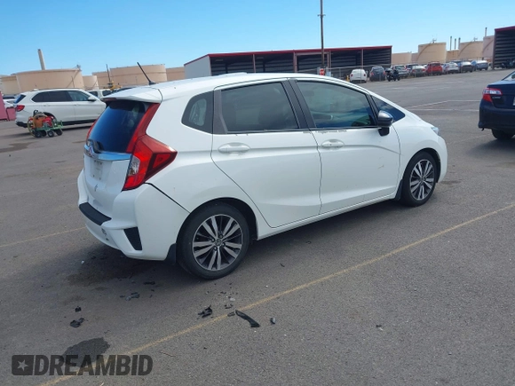 2015 Honda Fit EX-L with VIN 3HGGK5H8XFM753011, listed as a IAAI auction lot 41878734 with 121,514 mi miles and . Bid and sale history available at DreamBid. Image 4.