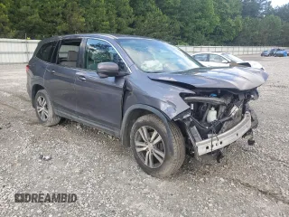 2018 Honda Pilot EX-L with VIN 5FNYF6H50JB038920, listed as a Copart auction lot 57465555 with 126,354 mi miles and Salvage title. Bid and sale history available at DreamBid. Image 4.