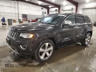 2015 Jeep Grand Cherokee Overland with VIN 1C4RJFCG7FC911899, listed as a Copart auction lot 54123925 with 243,031 mi miles and Salvage Title. Bid and sale history available at carsss.com. Image 1.