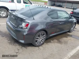 2015 Scion tC with VIN JTKJF5C73FJ008663, listed as a IAAI auction lot 41969395 with 125,758 mi miles. Bid and sale history available at carsss.com. Image 4.