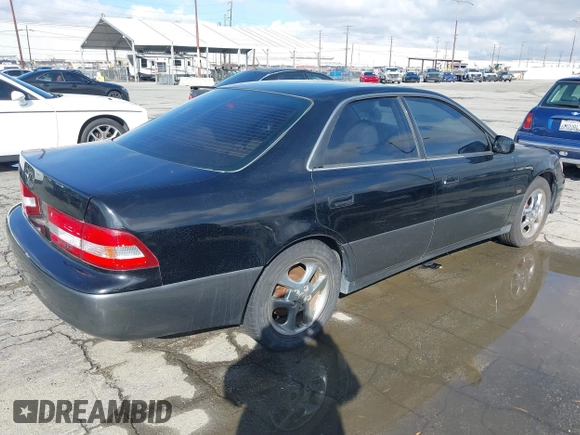 2001 Lexus ES with VIN JT8BF28GX10317370, listed as a IAAI auction lot 41512950 with 221,206 mi miles. Bid and sale history available at carsss.com. Image 4.