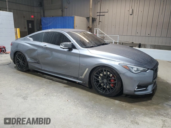 2017 Infiniti Q60 Red Sport 400 with VIN JN1FV7EL0HM701619, listed as a Copart auction lot 82981704 with 58,798 mi miles and Salvage title. Bid and sale history available at DreamBid. Image 4.