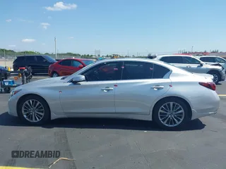 2019 Infiniti Q50 Luxe z VIN JN1EV7AP3KM510305, wystawiony jako IAAI lot #42225255 z przebiegiem 33 902 mil mil oraz . Historia ofert i sprzedaży dostępna na DreamBid. Obrazek 15.
