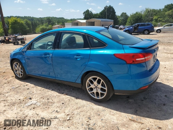 2015 Ford Focus SE with VIN 1FADP3F24FL200786, listed as a Copart auction lot 62662855 with 90,790 mi miles and Salvage title. Bid and sale history available at DreamBid. Image 2.