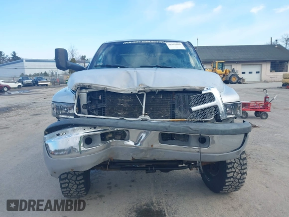 2001 Dodge 2500 with VIN 1B7KF23641J597636, listed as a IAAI auction lot 41843898 with 257,007 mi miles. Bid and sale history available at carsss.com. Image 6.
