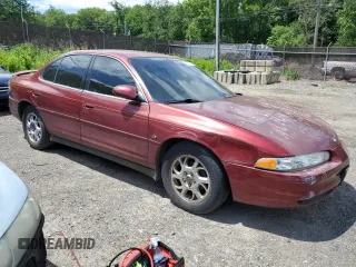 2000 Oldsmobile Intrigue GLS z VIN 1G3WX52HXYF349195, wystawiony jako Copart lot #57230215 z przebiegiem Nie podano mil oraz Szkody całkowita. Historia ofert i sprzedaży dostępna na DreamBid. Obrazek 4.
