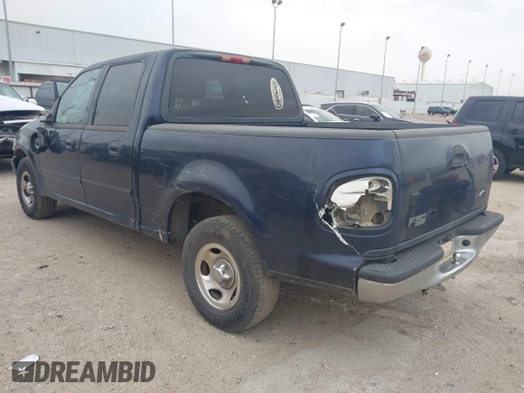 2003 Ford F-150 XLT with VIN 1FTRW07673KC94022, listed as a IAAI auction lot 41789268 with 271,047 mi miles. Bid and sale history available at carsss.com. Image 3.