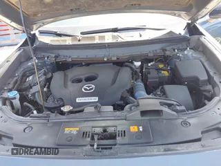 2021 Mazda CX-9 Carbon Edition with VIN JM3TCADY9M0517174, listed as a IAAI auction lot 41871485 with 48,484 mi miles and . Bid and sale history available at DreamBid. Image 10.