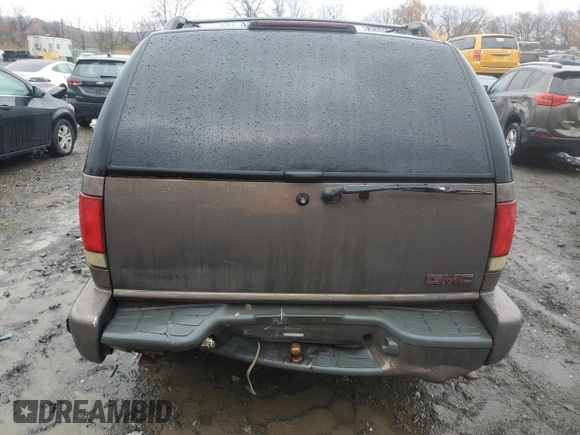 1998 GMC Jimmy SLE with VIN 1GKDT13W6W2535592, listed as a Copart auction lot 81953844 with 88,205 mi miles and Salvage Title. Bid and sale history available at carsss.com. Image 6.