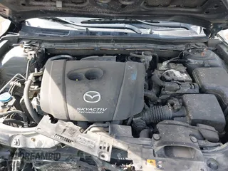 2014 Mazda 3 i Grand Touring with VIN JM1BM1M74E1212699, listed as a IAAI auction lot 41804428 with 195,472 mi miles and . Bid and sale history available at DreamBid. Image 10.
