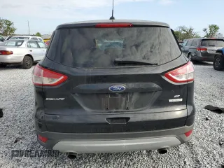 2014 Ford Escape SE with VIN 1FMCU0GX1EUA19463, listed as a Copart auction lot 51251195 with 122,249 mi miles and Salvage Title. Bid and sale history available at carsss.com. Image 6.