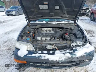 1999 Acura CL Premium z VIN 19UYA2250XL006640, wystawiony jako IAAI lot #41393749 z przebiegiem 77 308 mil mil oraz . Historia ofert i sprzedaży dostępna na DreamBid. Obrazek 10.