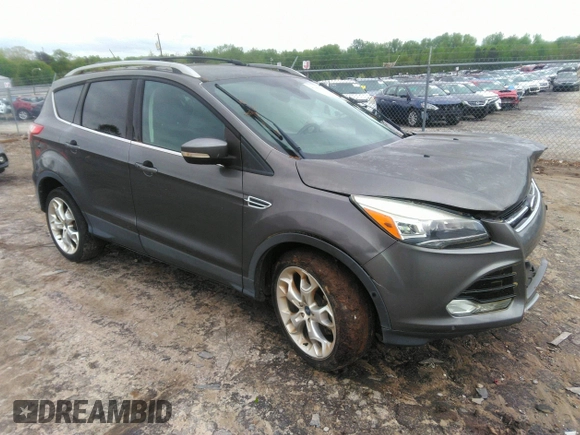 2013 Ford Escape Titanium with VIN 1FMCU0J92DUC70534, listed as a IAAI auction lot 41967096 with 77,921 mi miles and . Bid and sale history available at carsss.com. Image 1.