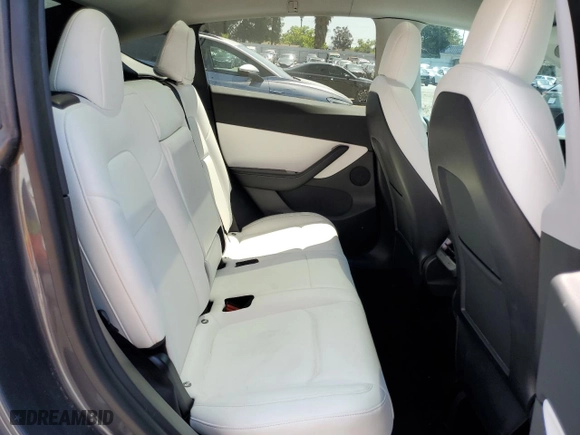 2021 Tesla Model Y Long Range with VIN 5YJYGDEEXMF070154, listed as a Copart auction lot 50742325 with 23,376 mi miles and Salvage Title. Bid and sale history available at carsss.com. Image 11.
