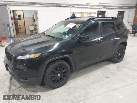 2014 Jeep Cherokee Latitude with VIN 1C4PJMCS6EW299532, listed as a IAAI auction lot 41833888 with 199,915 mi miles and . Bid and sale history available at DreamBid. Image 17.
