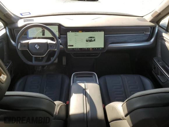 2023 Rivian R1S Adventure with VIN 7PDSGBBA4PN022157, listed as a Copart auction lot 81359984 with 13,522 mi miles and Salvage Title. Bid and sale history available at DreamBid. Image 8.