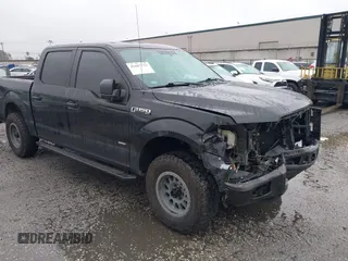 2015 Ford F-150 XL with VIN 1FTEW1CGXFKD98530, listed as a IAAI auction lot 41687753 with 104,281 mi miles. Bid and sale history available at carsss.com. Image 1.