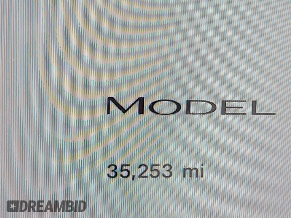 2023 Tesla Model Y Long Range with VIN 7SAYGDEE1PA169031, listed as a IAAI auction lot 41660766 with 35,253 mi miles and . Bid and sale history available at DreamBid. Image 16.
