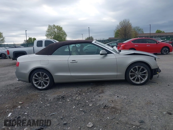 2014 Audi A5 Premium Plus z VIN WAULFAFH7EN001894, wystawiony jako IAAI lot #42082669 z przebiegiem 78 624 mil mil oraz . Historia ofert i sprzedaży dostępna na DreamBid. Obrazek 13.