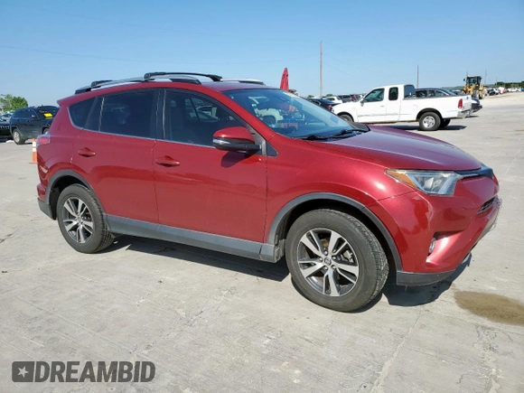 2018 Toyota RAV4 XLE with VIN JTMRFREV4JD234778, listed as a Copart auction lot 52715065 with 131,407 mi miles and Salvage Title. Bid and sale history available at carsss.com. Image 4.