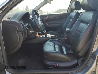 2003 Volkswagen Passat GLX z VIN WVWRH63B93P354188, wystawiony jako Copart lot #69510584 z przebiegiem 125 225 mil mil oraz Szkoda całkowita • Salvage title. Historia ofert i sprzedaży dostępna na DreamBid. Obrazek 7.