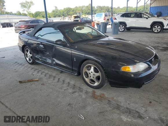 1996 Ford Mustang Cobra with VIN 1FALP46V0TF188786, listed as a Copart auction lot 57933355 with 36,931 mi miles and Salvage title. Bid and sale history available at DreamBid. Image 4.