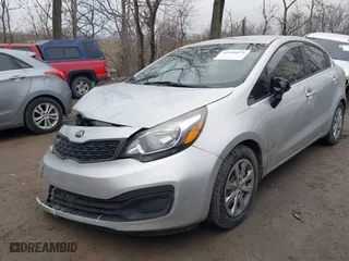2015 Kia Rio LX with VIN KNADM4A39F6452036, listed as a IAAI auction lot 41516879 with 95,775 mi miles. Bid and sale history available at carsss.com. Image 6.