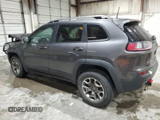 2020 Jeep Cherokee Trailhawk z VIN 1C4PJMBX5LD591873, wystawiony jako Copart lot #54308695 z przebiegiem 34 615 mil mil oraz Szkoda całkowita • Salvage title. Historia ofert i sprzedaży dostępna na DreamBid. Obrazek 2.