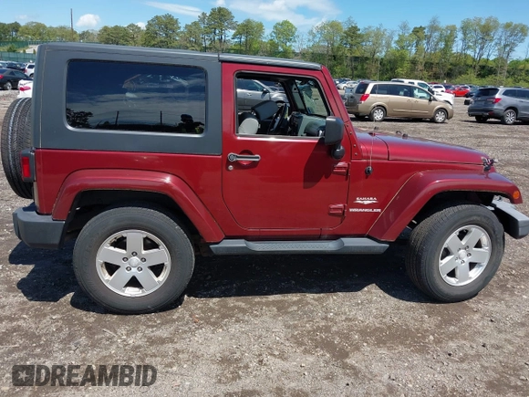 2010 Jeep Wrangler Sahara z VIN 1J4GA5D16AL227053, wystawiony jako IAAI lot #42219421 z przebiegiem 67 174 mil mil oraz . Historia ofert i sprzedaży dostępna na DreamBid. Obrazek 13.